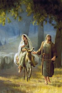 Mary with Son on donkey and Joseph traveling