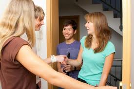 Youth Greeting Visitors